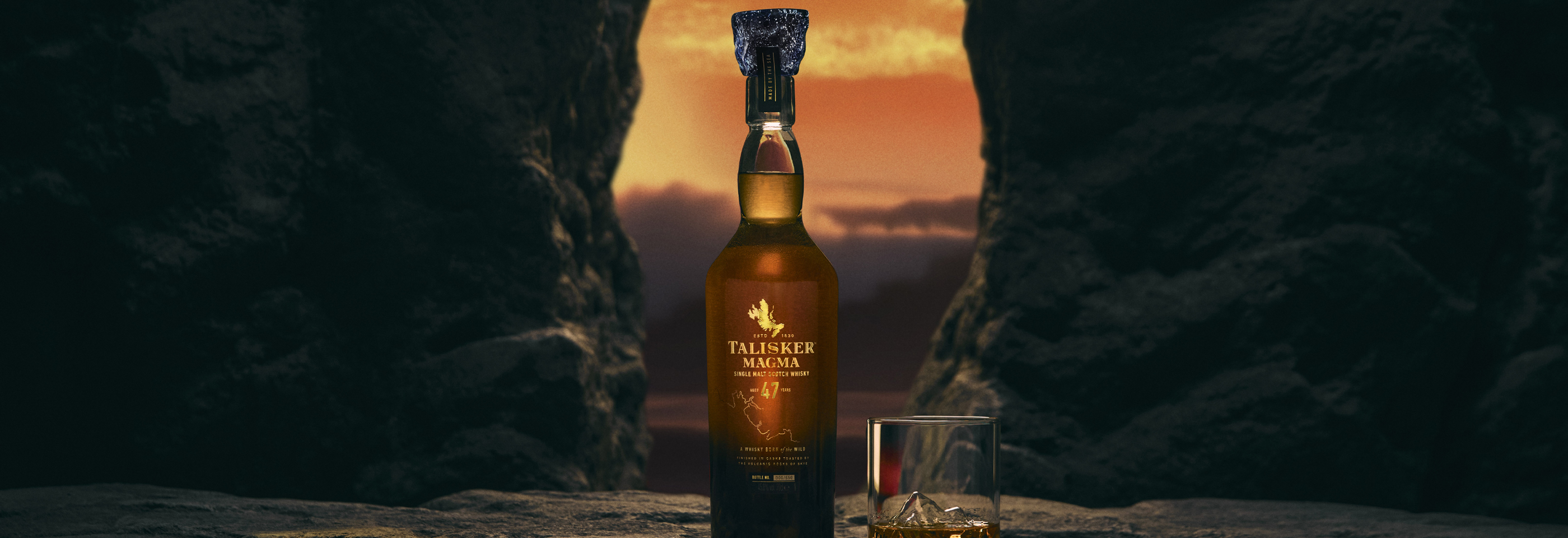 bottle of talisker on rocks