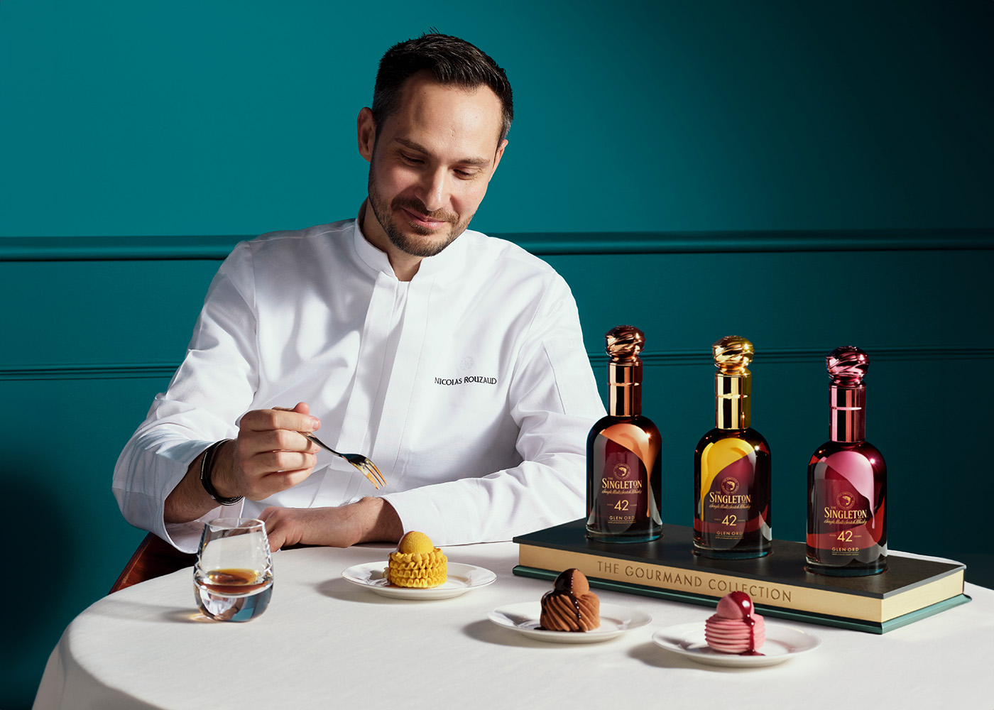 Master Pâtissier, Nicolas Rouzaud with a fork on the dessert for The Singleton Gourmand Collection