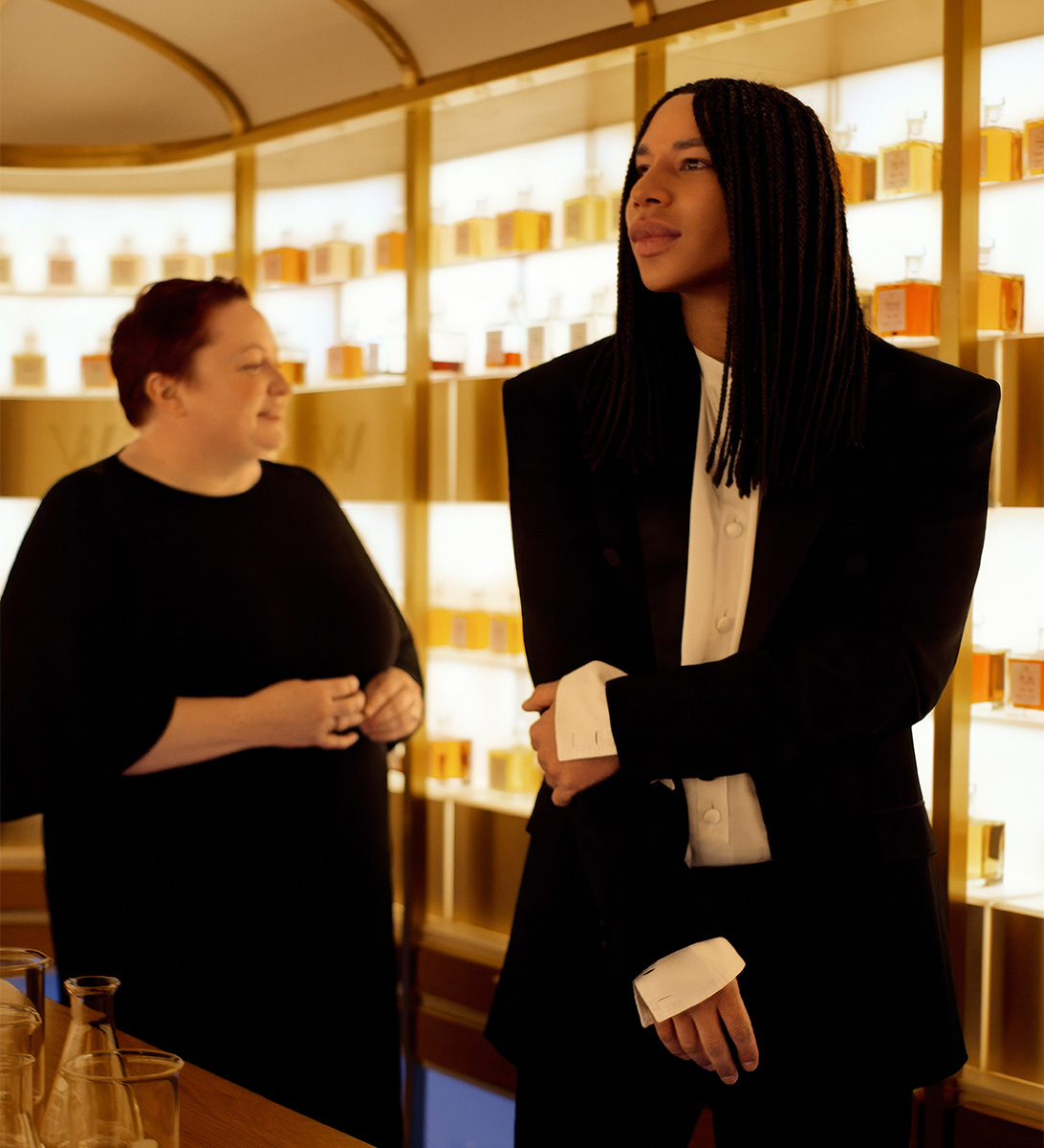 Olivier Rousteing and Dr Emma Walker walking around the Johnnie Walker Vault