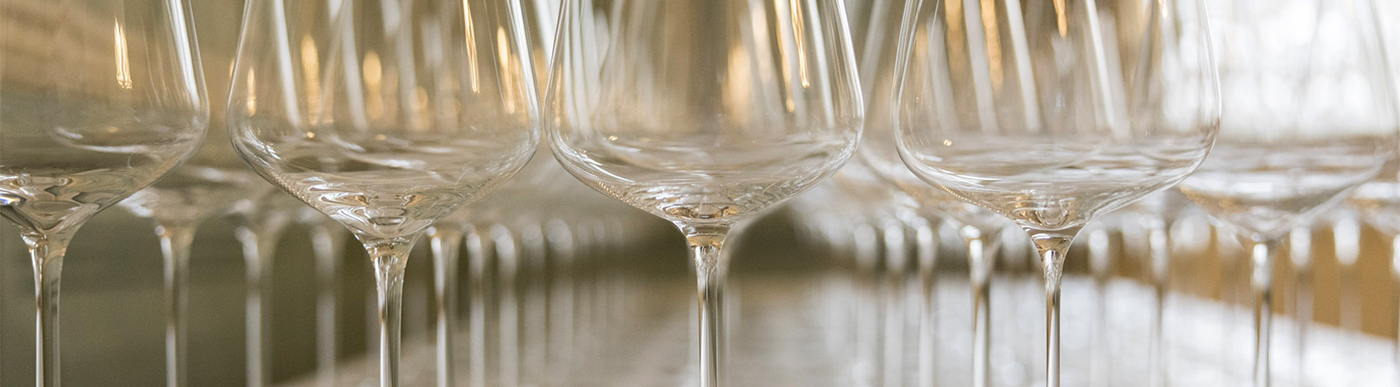 A number of empty glasses of wines