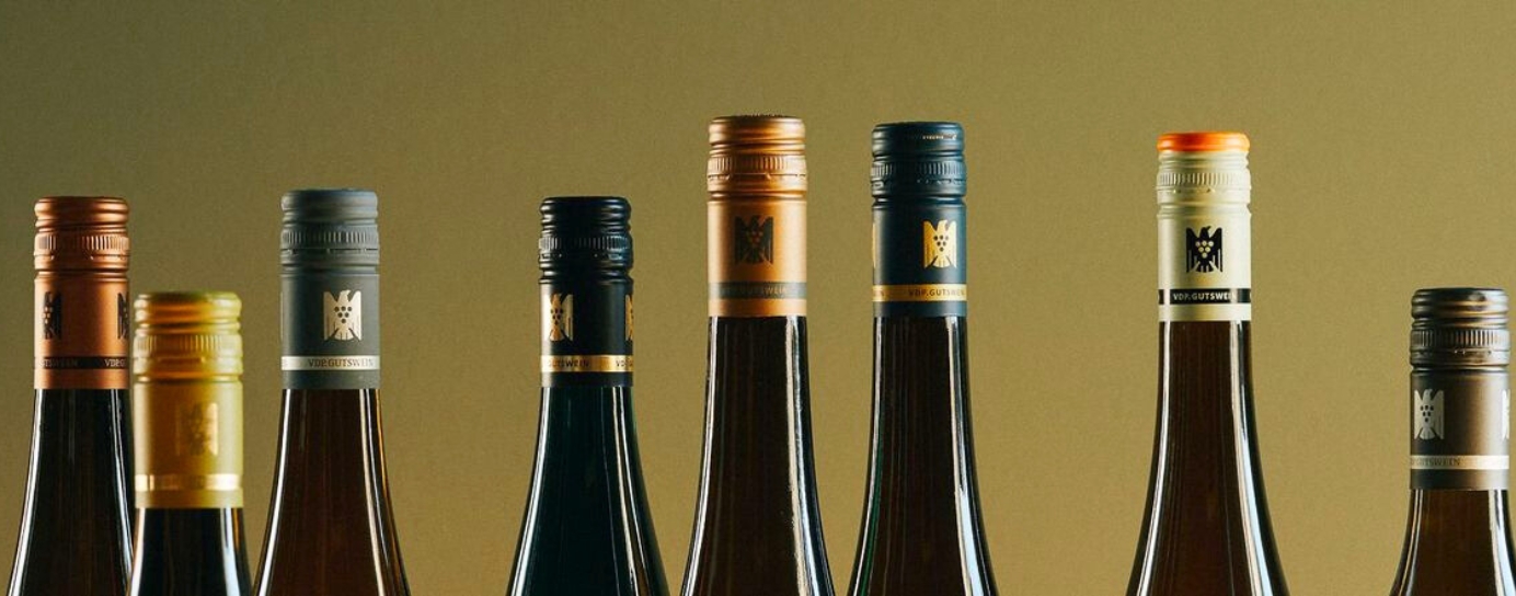 A bottles of German wines in a row in different heights