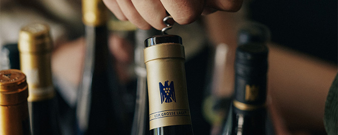 Bottles of of German wine being uncorked