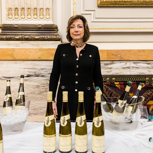 Domaine Weinbach stood behind a table of wines