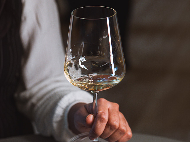 White Burgundy being swirled in a glass