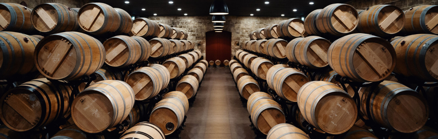 A room full of Bordeaux wine barrells 