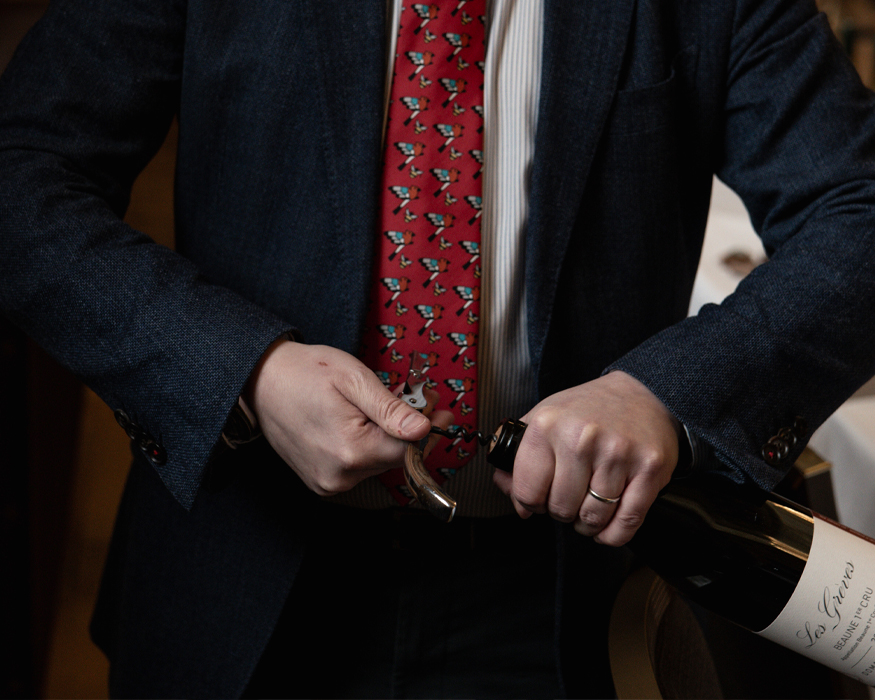 A wine bottle being uncorked, Large Format