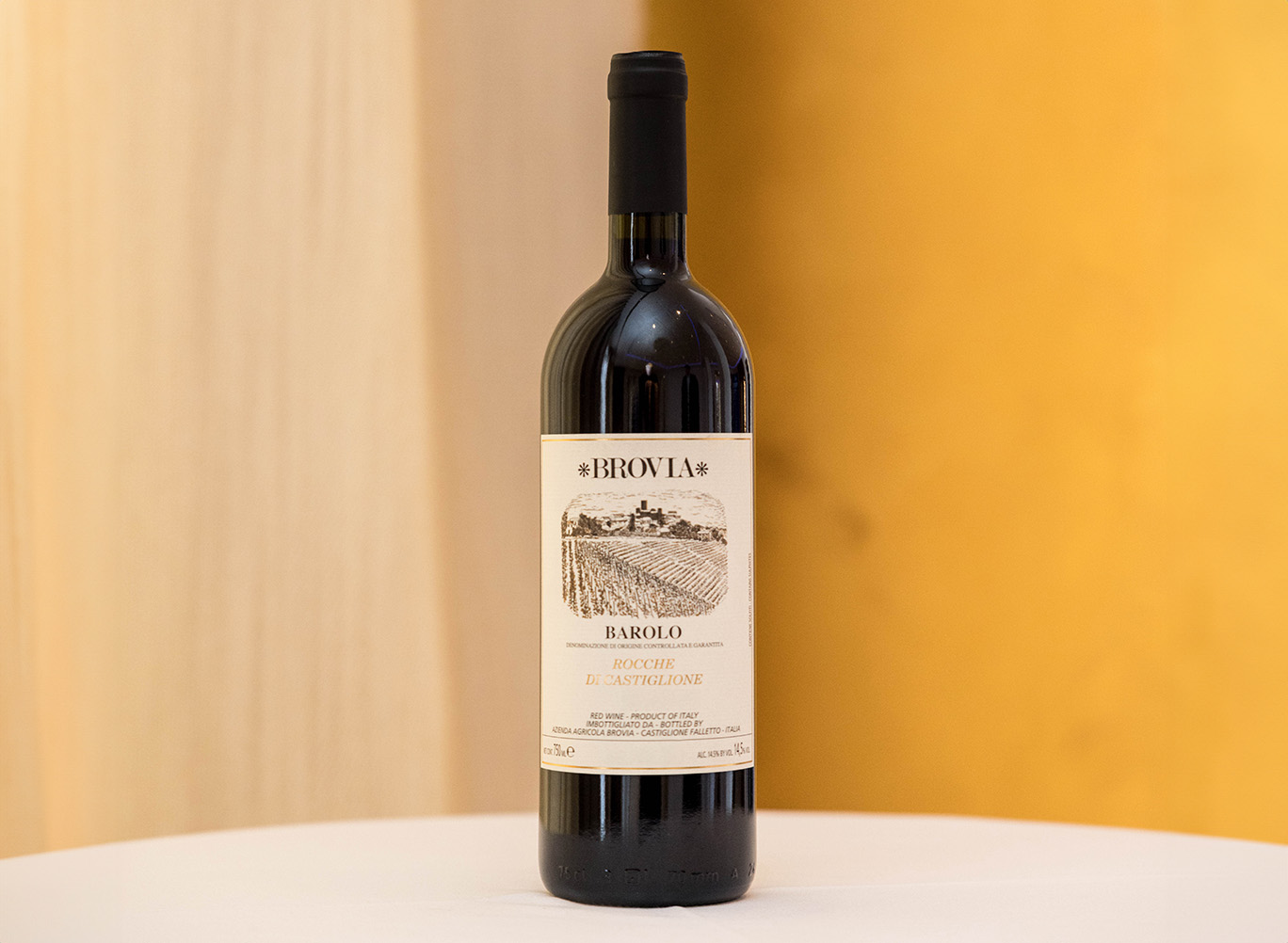 A bottle of Barolo, Brovia on a white table