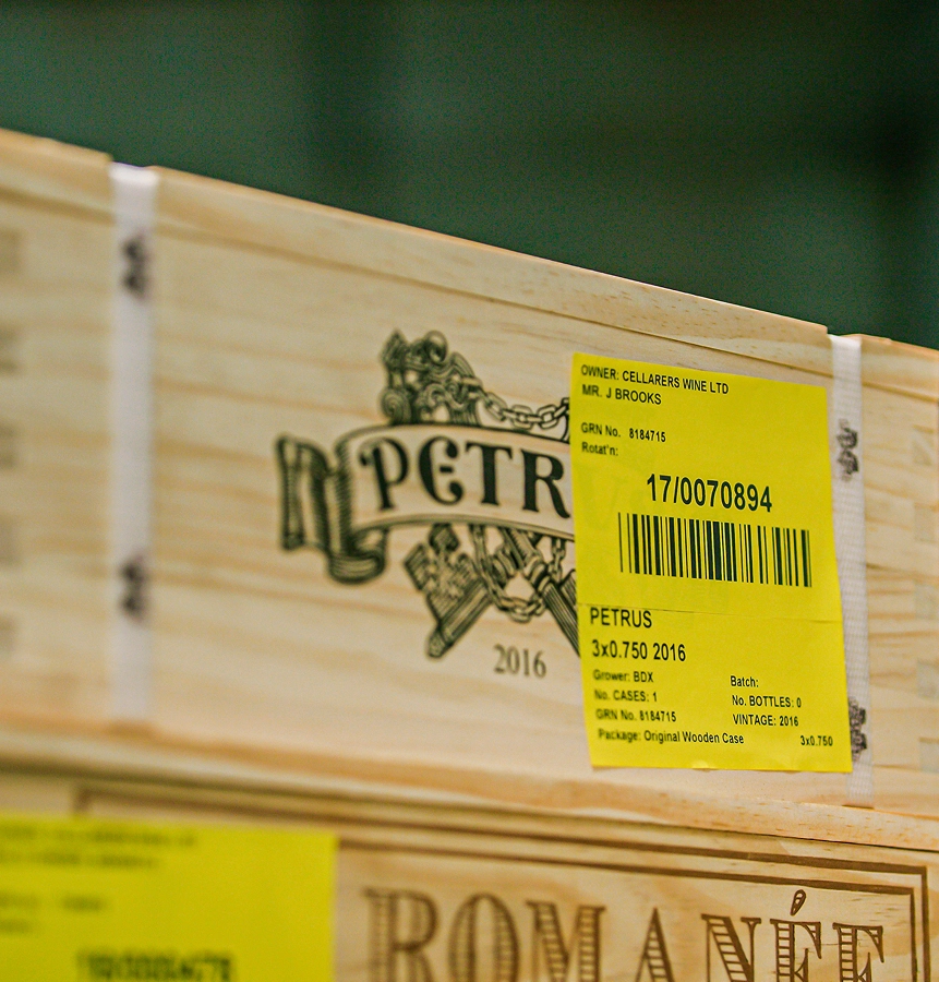 A Petrus wien box in storage in Justerini & Brooks with a label