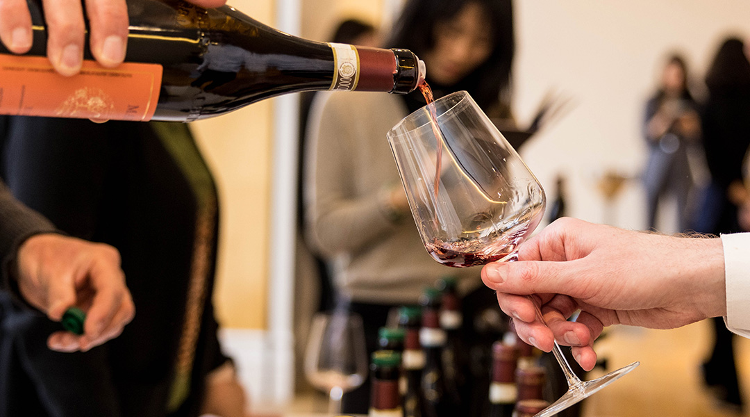 Red wine being poured into a glass