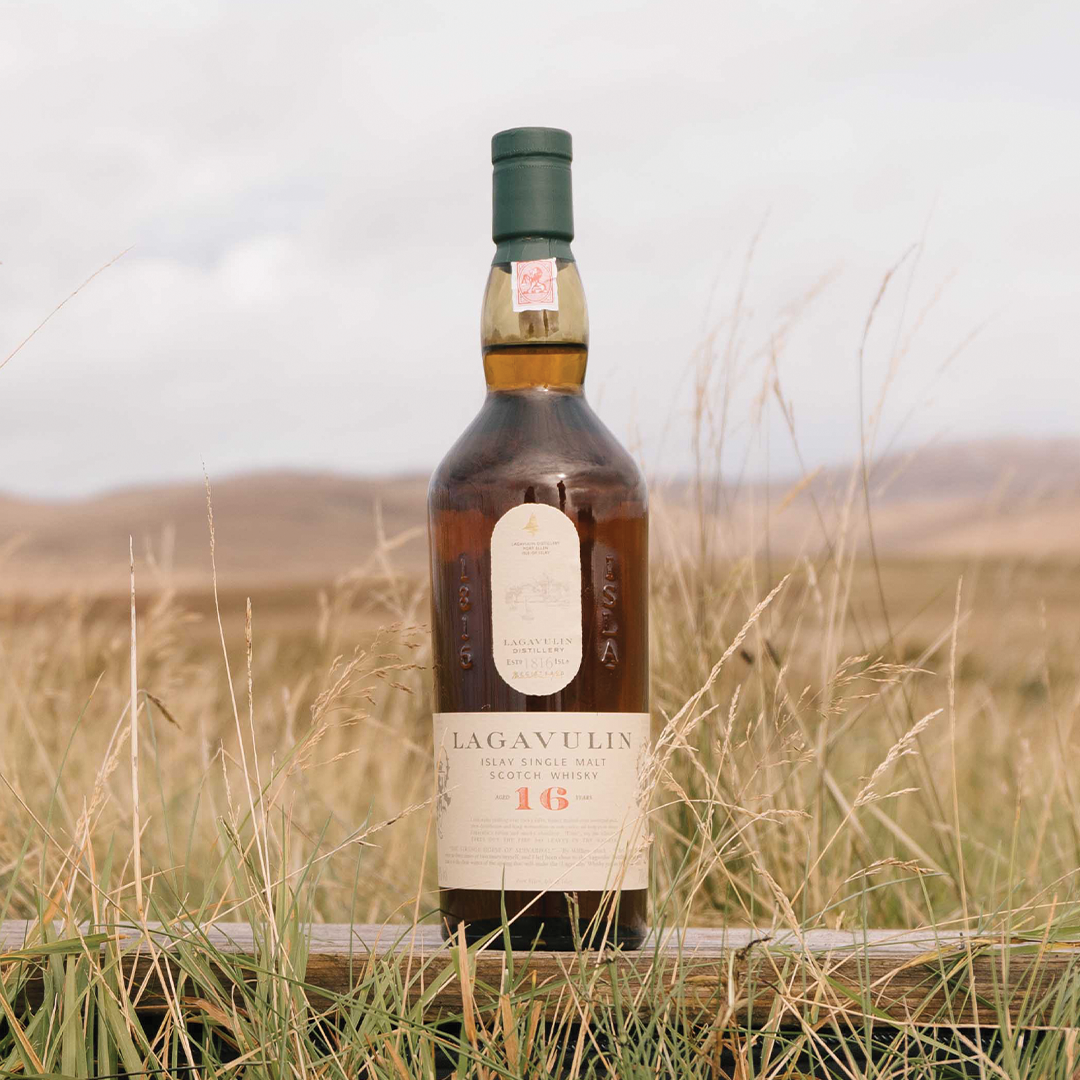 Bottle in front of a field