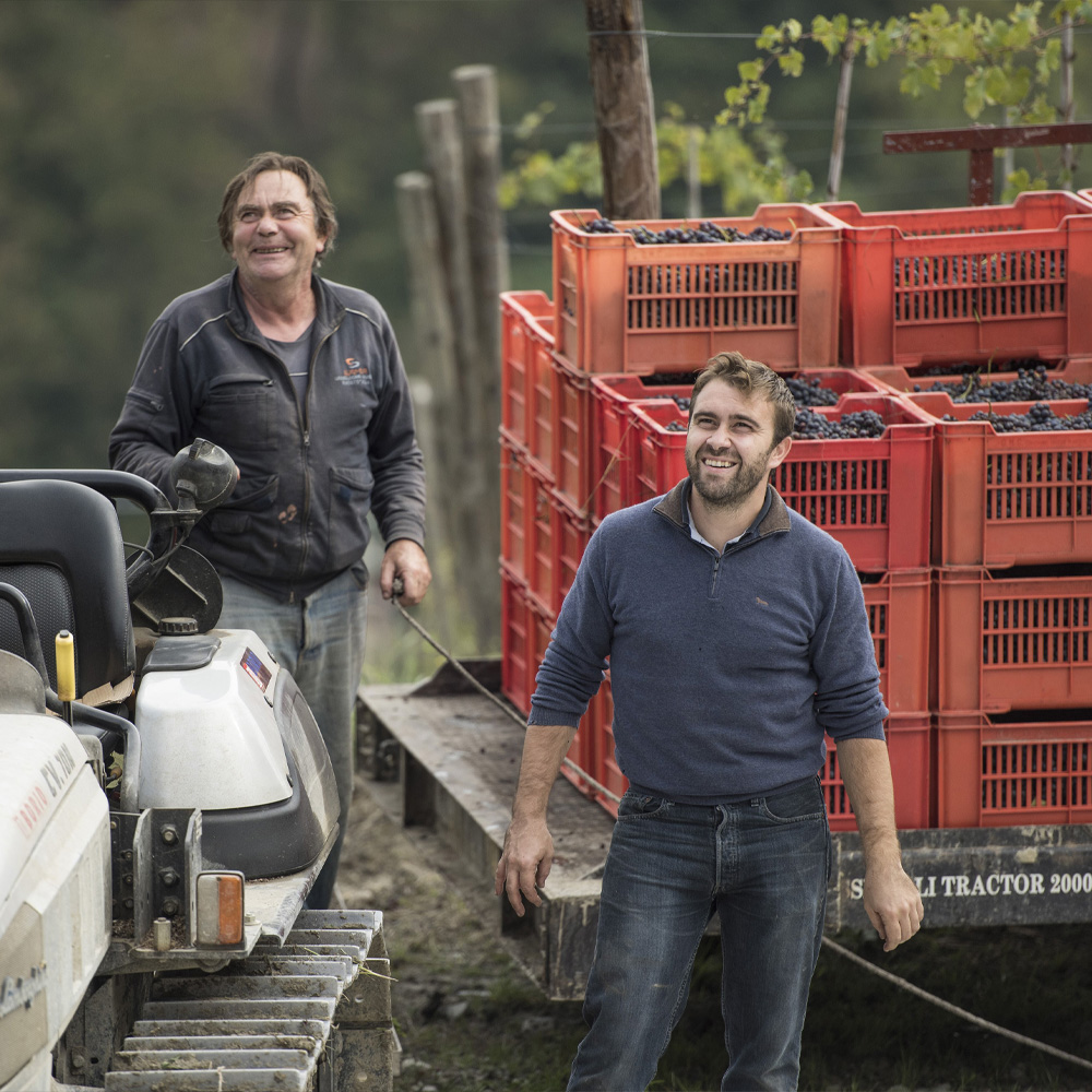Luca and father in a field