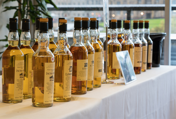 bottles lined up on a table