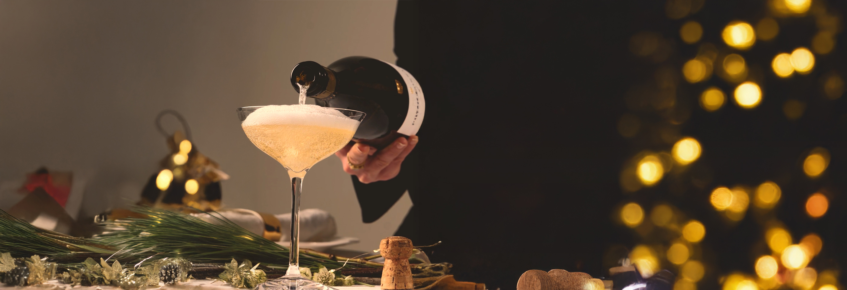 Pouring bottle of champagne