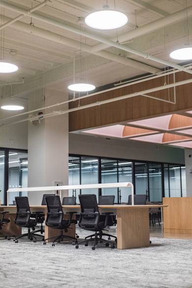 Paris office, open space with rows of desks.