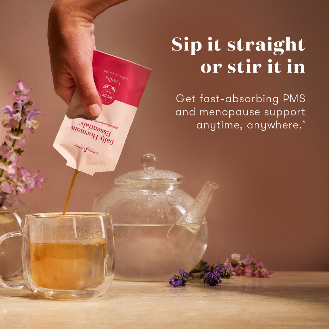 A hand pours Daily Hormone Essentials from its pouch into a glass mug beside a clear teapot. The background is styled with lavender and other botanicals. Text reads: “Sip it straight or stir it in. Get fast-absorbing PMS and menopause support anytime, anywhere.”