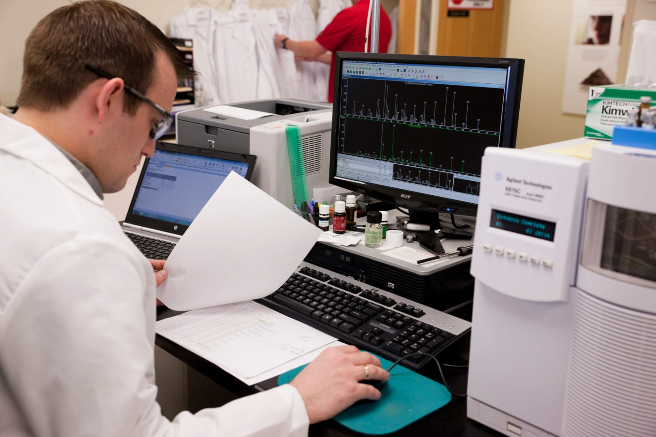 Scientist looking at reports