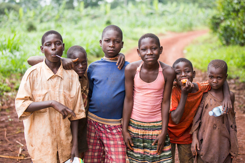 Kids with their arms around each other