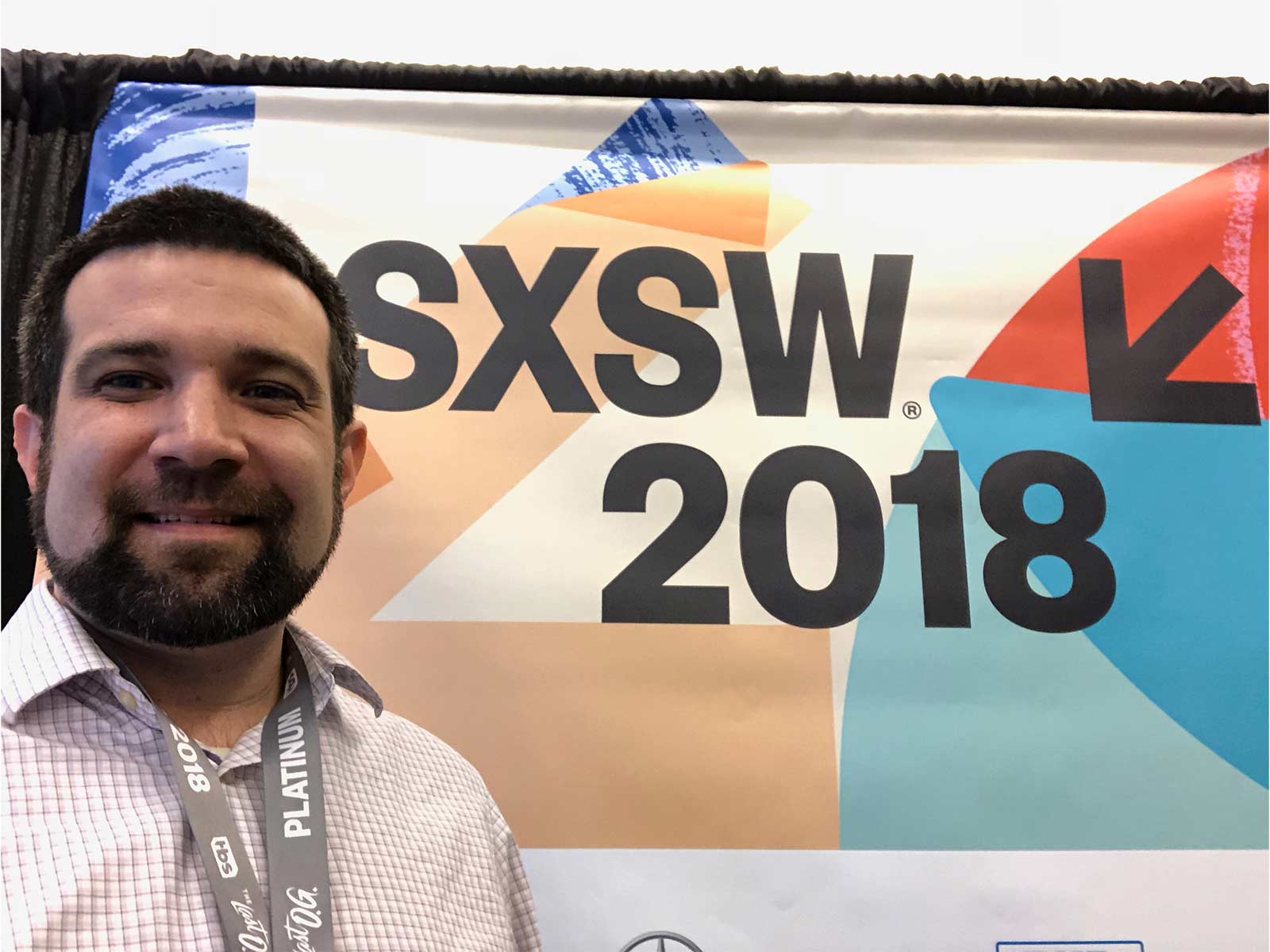Sean Doherty in front of SXSW 2018 sign