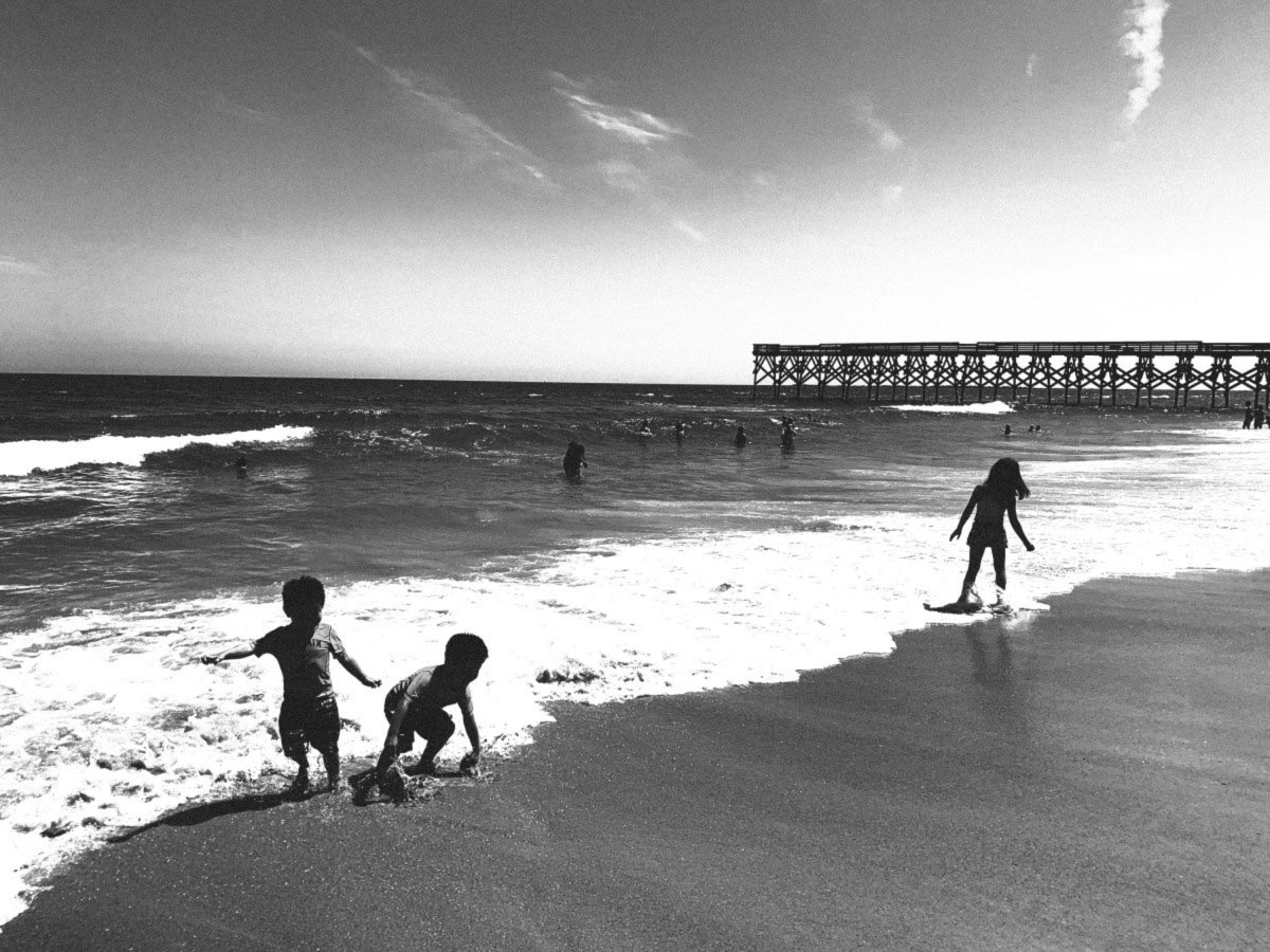 Don's kids playing at the beach