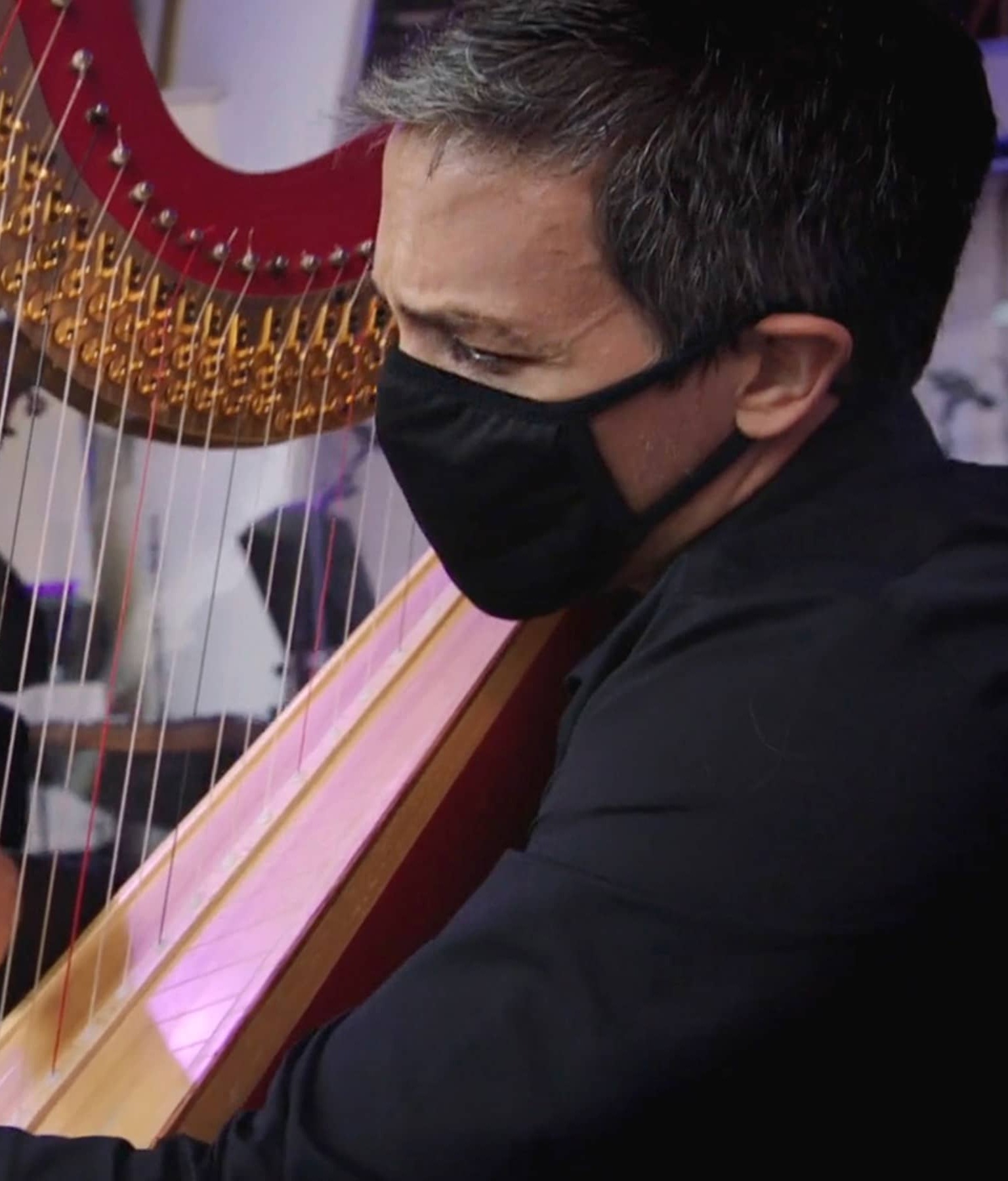 Harpist Emmanuel Ceysson during a performance for SOUND/STAGE.
