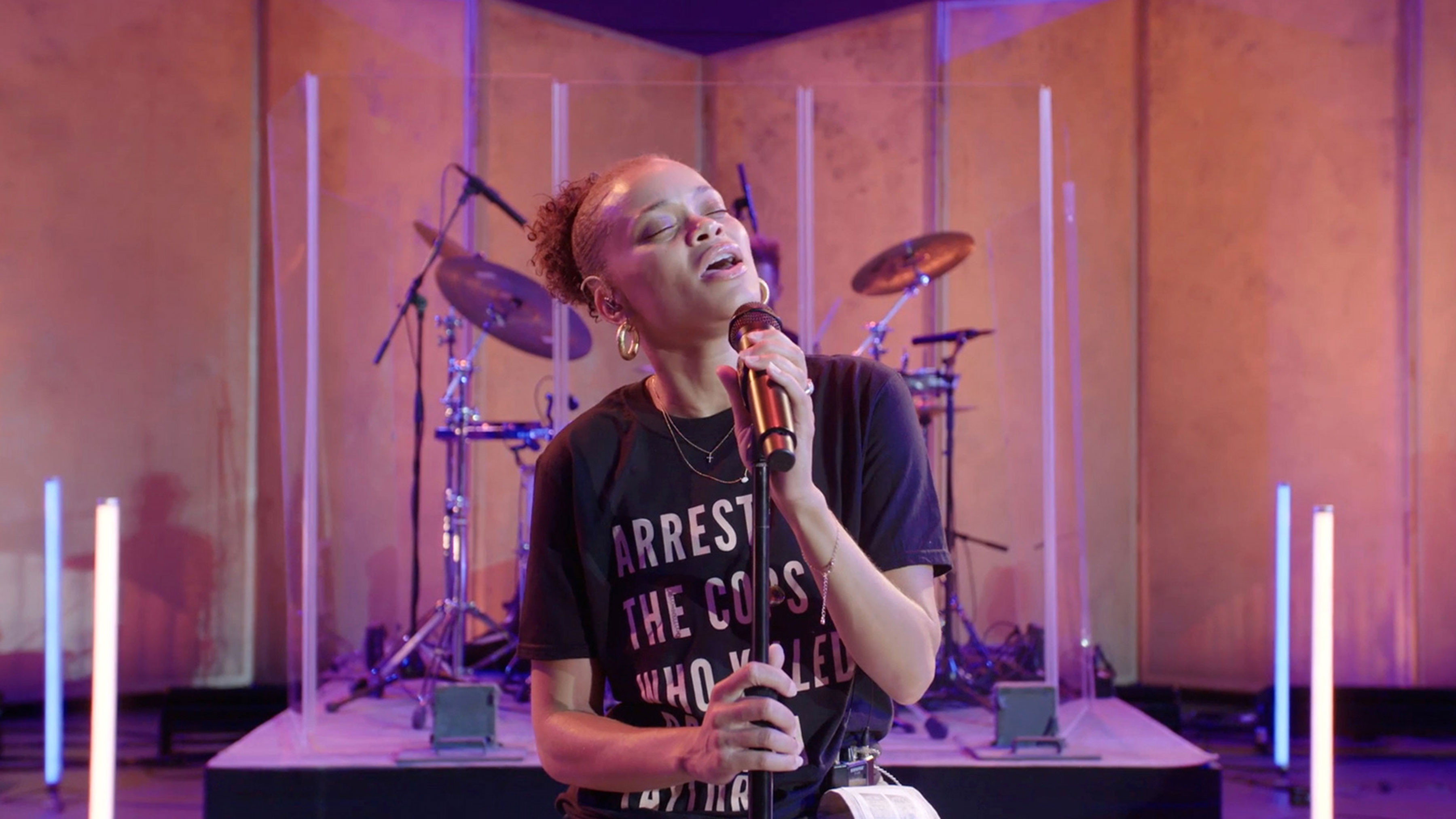 Singer Andra Day performing with her band on the stage of the Hollywood Bowl