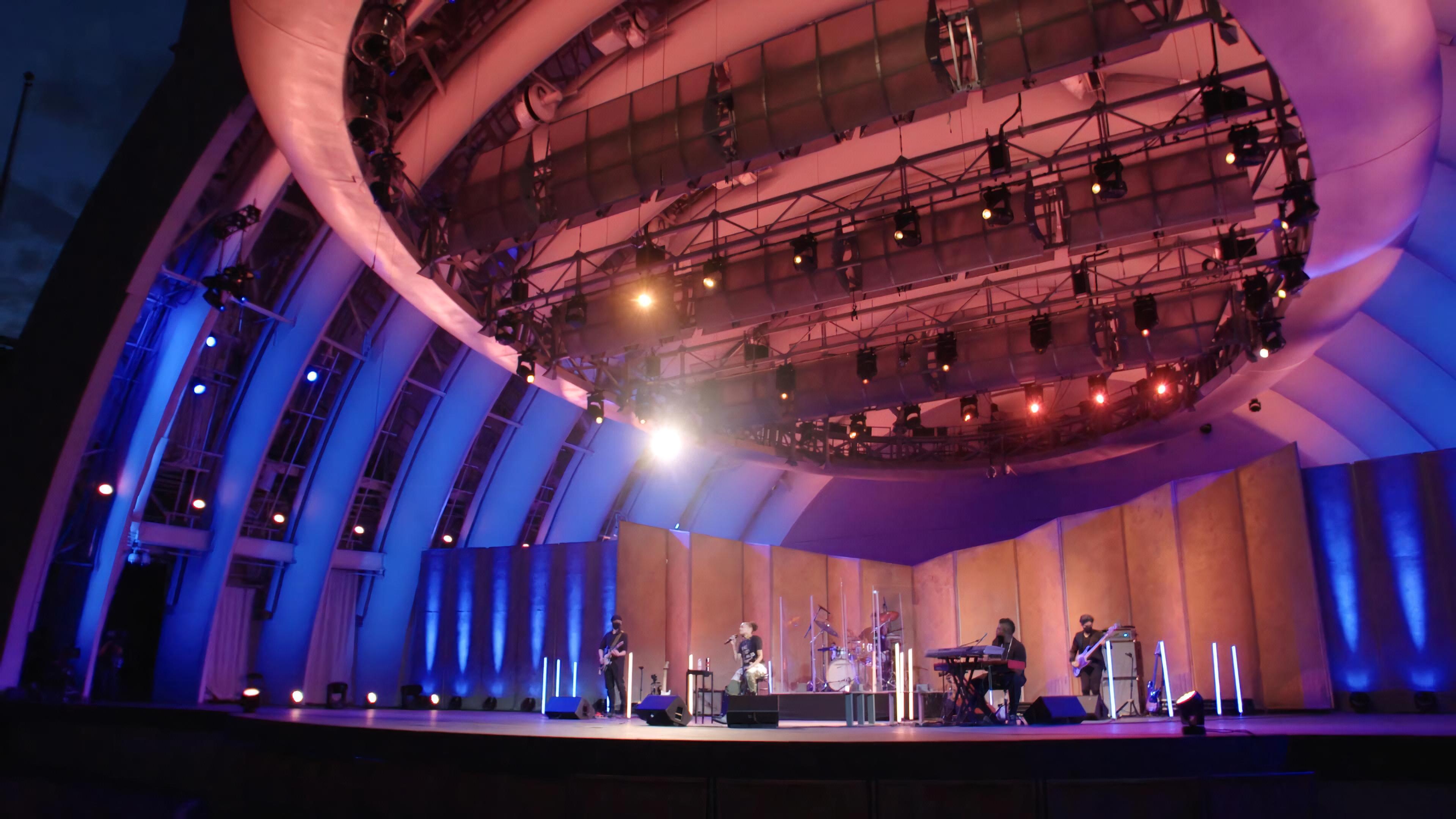 Andra Day and band on the stage of the Hollywood Bowl performing “Rise Up,” the unofficial anthem of the movement