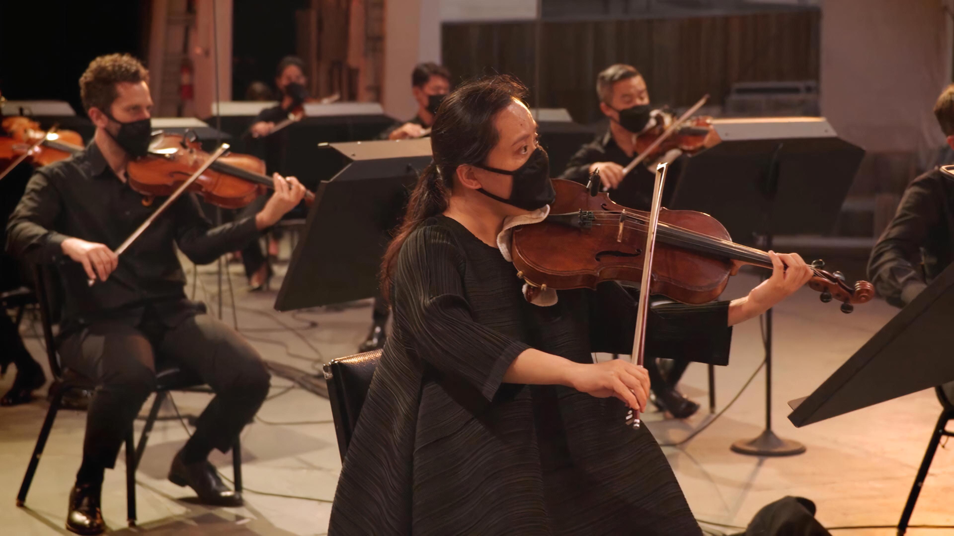 Principal Viola Teng Li performing for “Power to the People!”