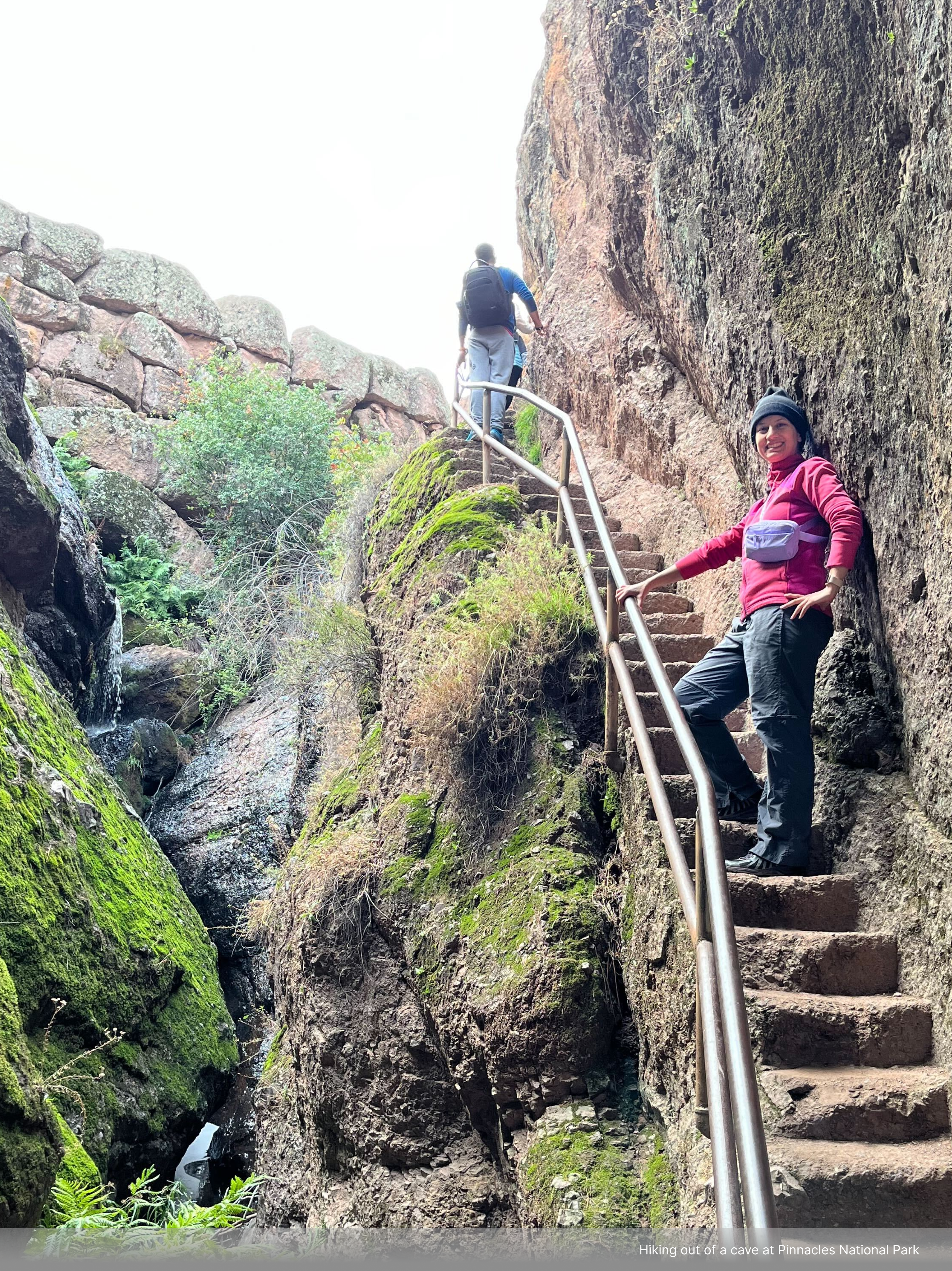 Sarah hiking out of a cave at Pinnacles National Park