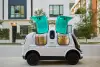 Image of automated vehicle with groceries inside