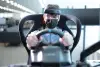 Man on driving simulator