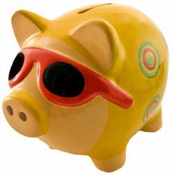 Photo of a yellow piggy bank with red and black sunglasses.