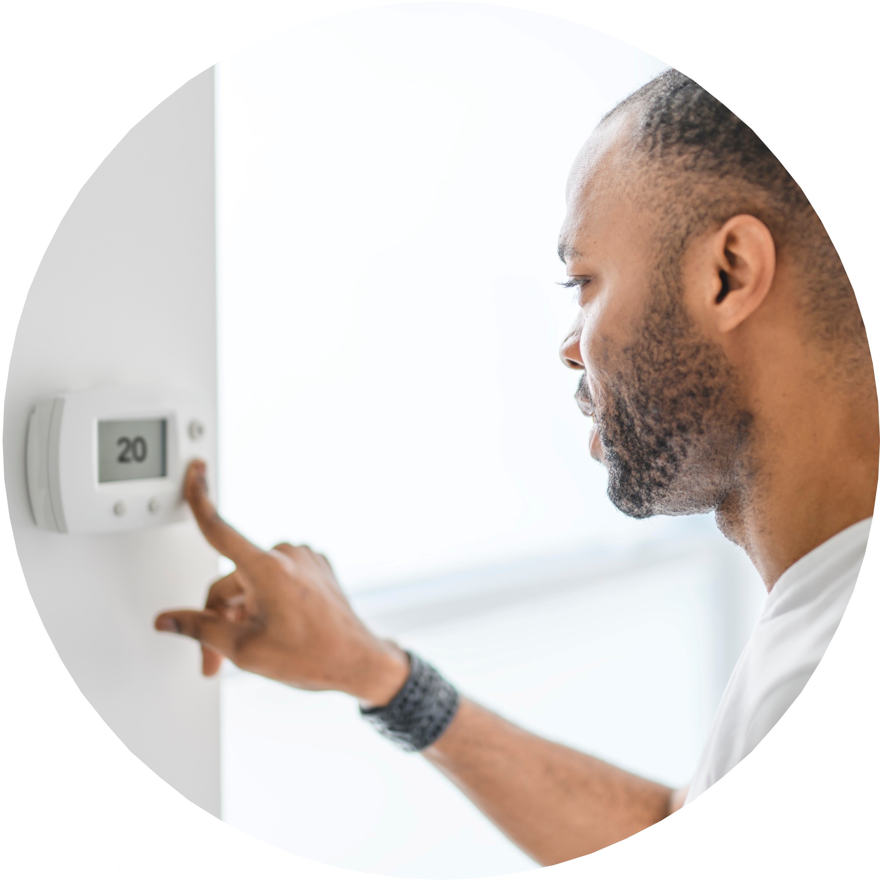 Man_using_thermostat_circle.jpg