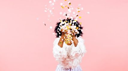 Vector image of a figure on a computer screen running and holding up a gold trophy.