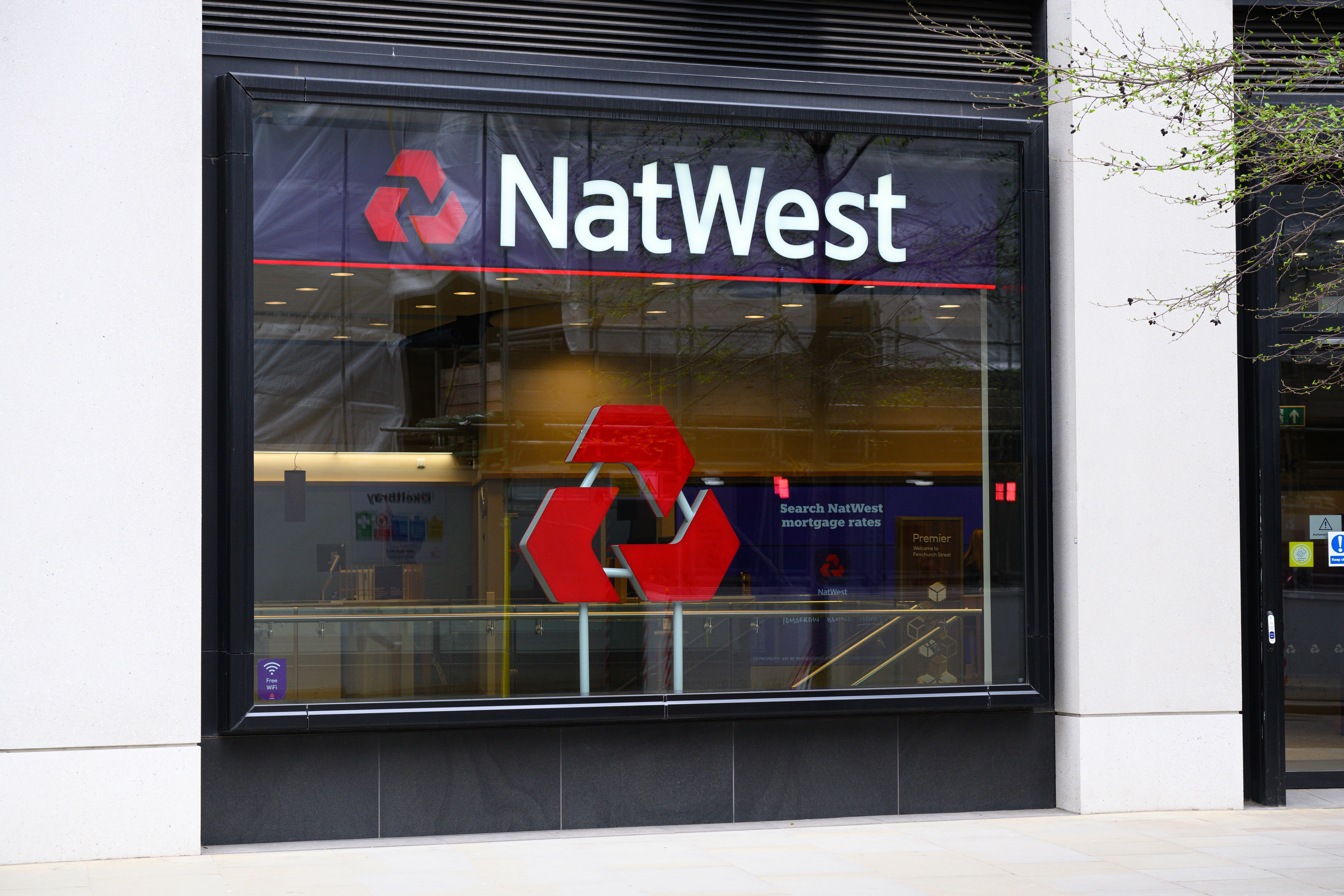 Image shows the outside of a NatWest bank branch