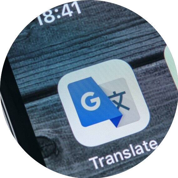 A close-up of the Google Translate app, on the home screen of a phone.