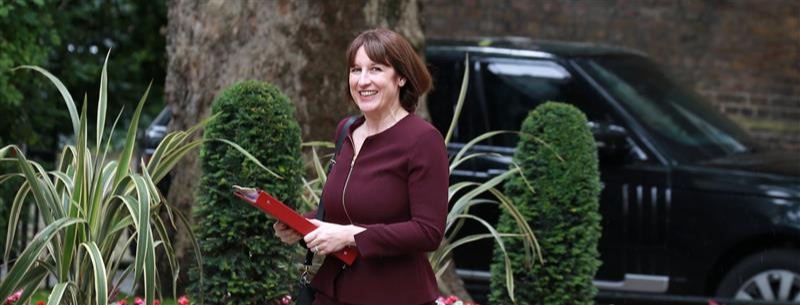 Chancellor Rachel Reeves carrying a red folder
