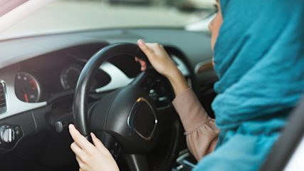 car with piles of money