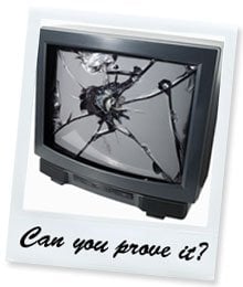 Polaroid of a smashed TV with the words "Can you prove it?" on the bottom.