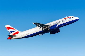 A British Airways plane in the air.