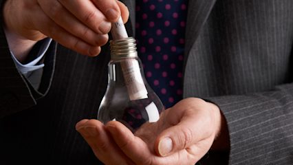 hero-homepage-energy-light-bulb-businessman-20-pound-note-cash.jpg