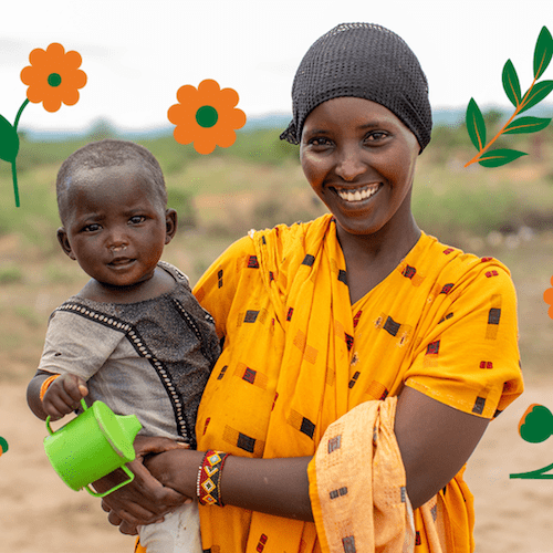 A black woman in bright yellow clothing and her baby smile at the camera