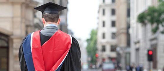 Graduate in cap and gown
