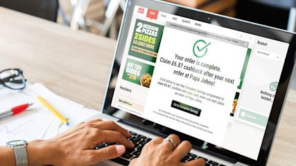 An older couple celebrating getting a refund.