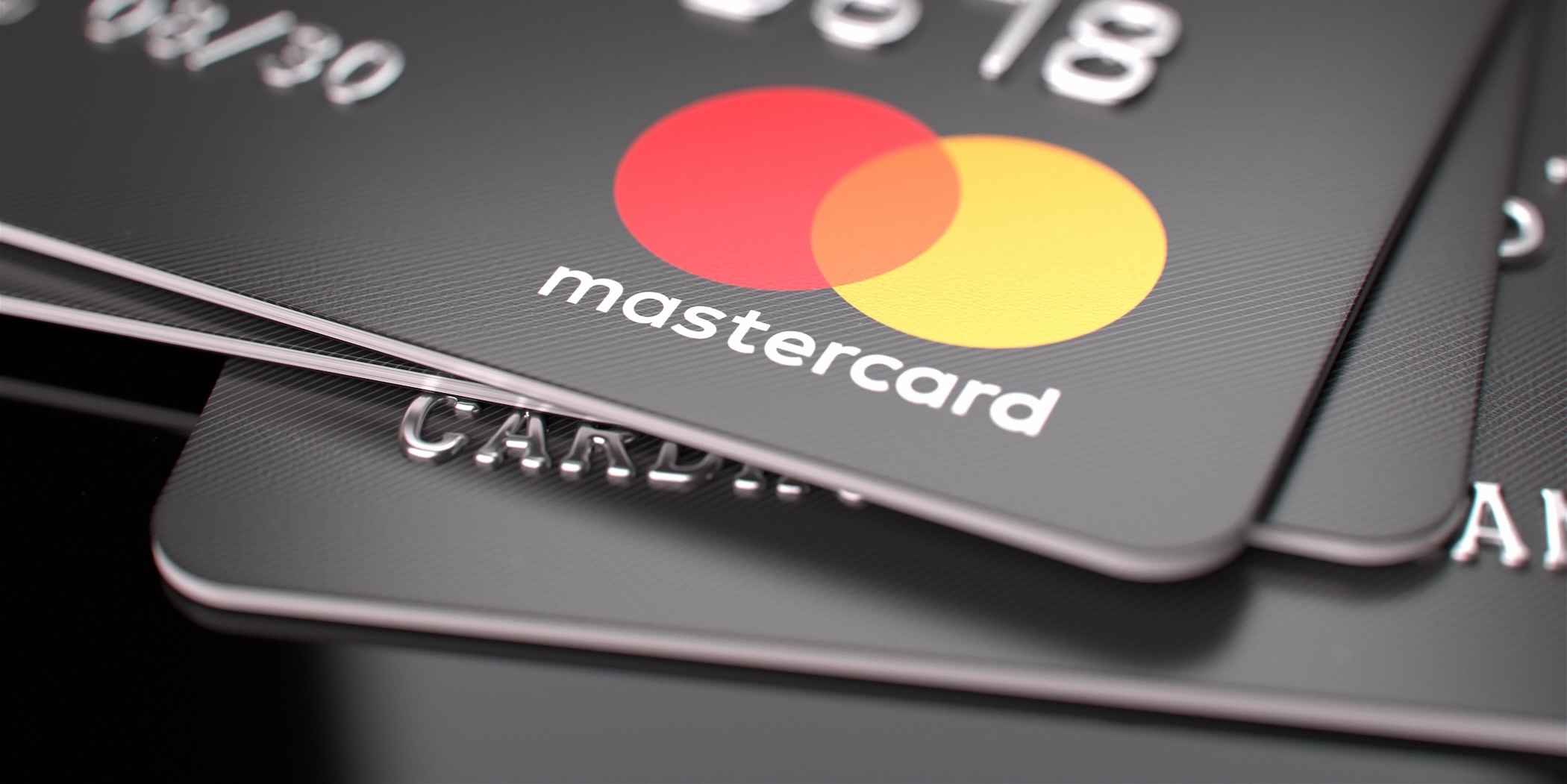 Mastercard credits cards in a pile