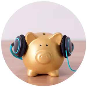 Piggy bank wearing headphones.