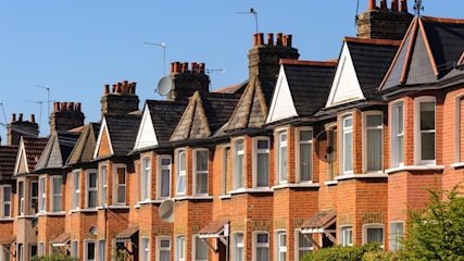Neat row of terraced red brick houses