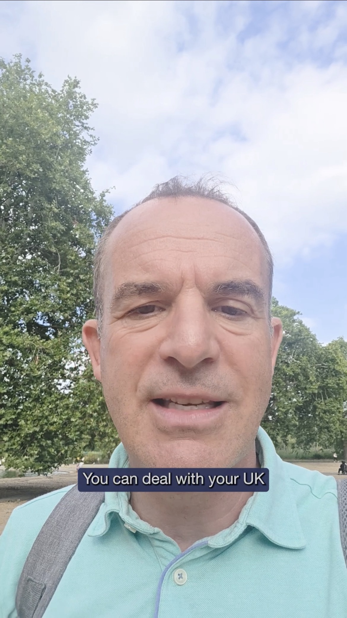 A still from Martin's 'consumer voodoo' video, showing Martin's face in close-up and a caption reading "You can deal with your UK card firm".