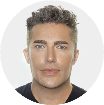 A headshot of a man wearing a black t-shirt