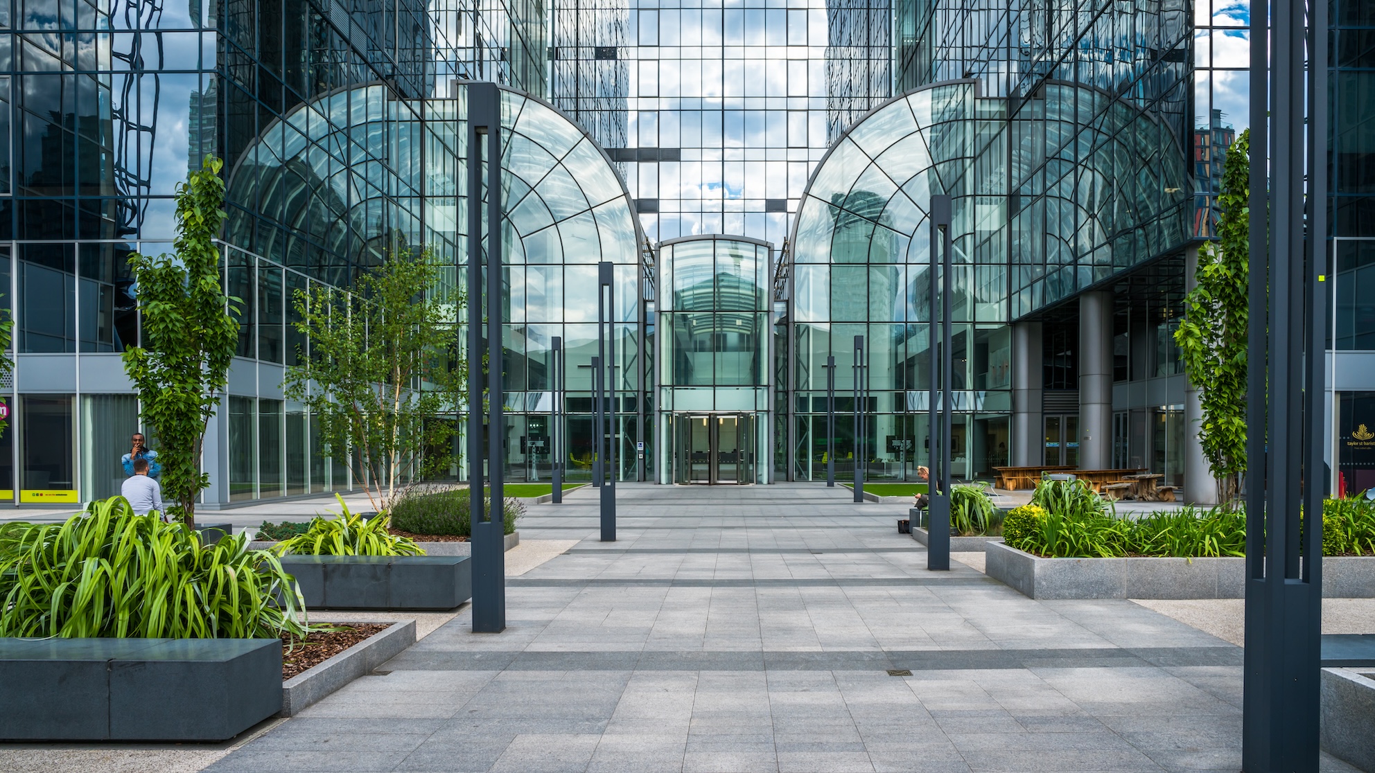Exterior of the shiny glass and steel office tower housing the Financial Ombudsman Service head office