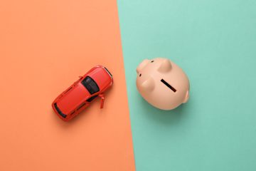 Miniature car toy and a piggy bank